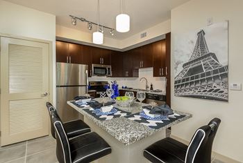 Chef-Style Kitchens with Stainless Appliances & Granite Counters at Azura, Miami, 33186